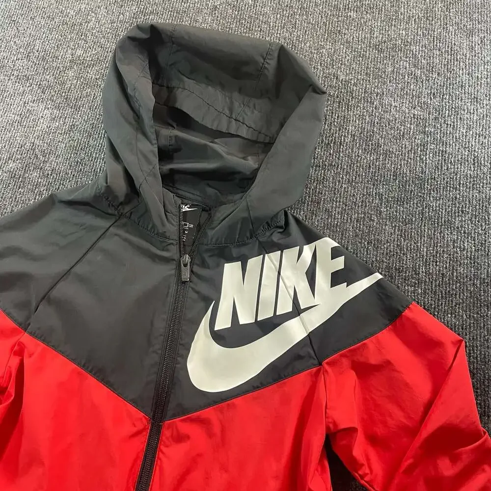 Nike packable loose fit Windrunner.  Youth medium